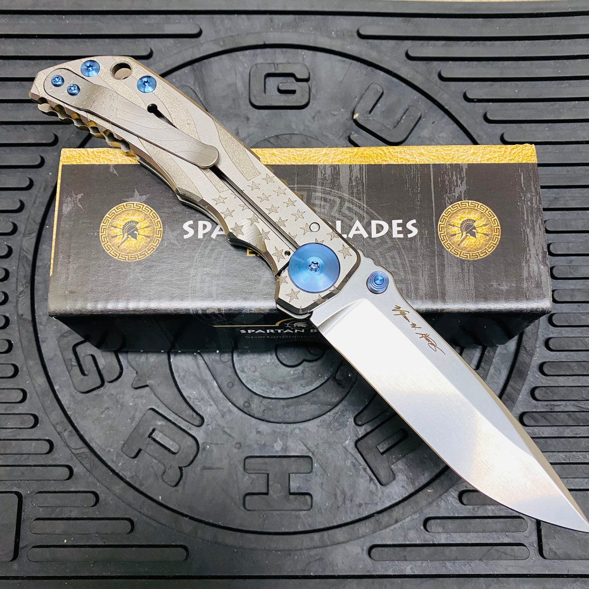 Spartan Blades Harsey Folder - Gray American Waving Flag Satin Magnacut Blade, Blue ANO Hardware Knife
