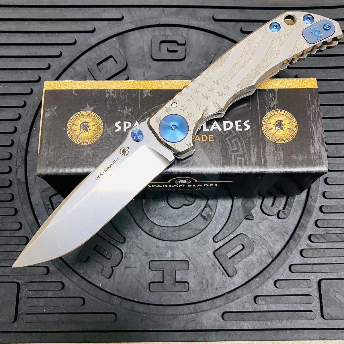 Spartan Blades Harsey Folder - Gray American Waving Flag Satin Magnacut Blade, Blue ANO Hardware Knife
