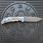 Spartan Blades Harsey Folder - Memento Mori 2023 Theme, PVD Magnacut Blade, Blue ANO Hardware Knife