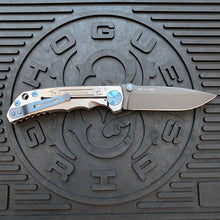 Load image into Gallery viewer, Spartan Blades Harsey Folder - Memento Mori 2023 Theme, PVD Magnacut Blade, Blue ANO Hardware Knife
