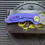 Curtiss Custom F3 Medium 3" Spanto Flipper, Purple Titanium FJ-Mill "Dragon Scale", Stonewash Magnacut, Yellow Titanium Hardware Folding Knife